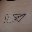 Origami airplane tattoo