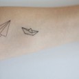 Origami boat tattoo